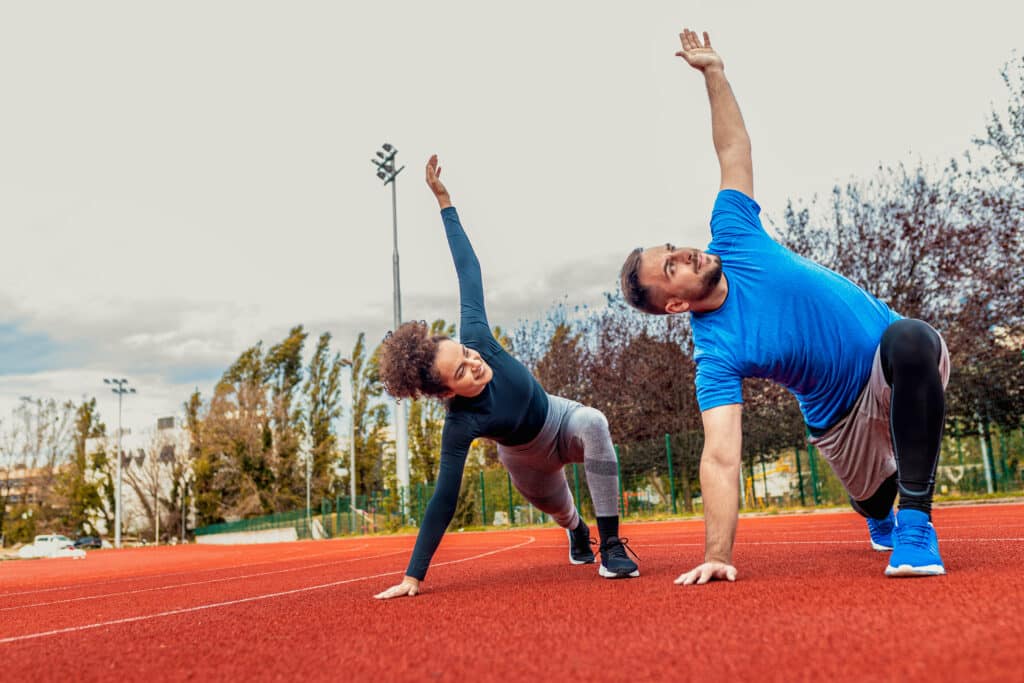 image of two athletes who want to improve their performance with IV hydration therapy